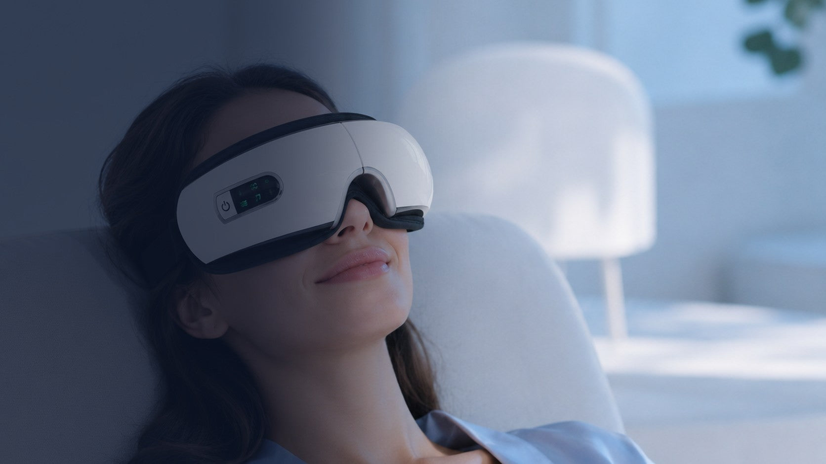 Woman relaxing while wearing the Relivaxe eye massager
